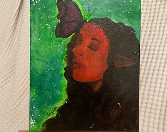 May include: A painting of a person with a butterfly on their head. The person has closed eyes and a red face. The background is green with white speckles. The painting is signed "Daijah".