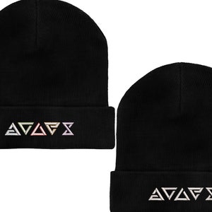 May include: Two black knitted beanies with a white embroidered symbol on the front. The symbol is a series of triangles with the word "AVAFX" written below.