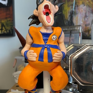 Pregnant Goku Sculpture