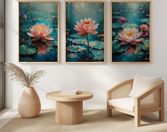 May include: Three framed art prints featuring impressionistic paintings of pink lotus flowers floating on water. The artwork has a teal and blue color palette with green lily pads. The frames are a light wood color.