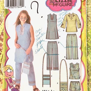 May include: Simplicity sewing pattern featuring Lizzie McGuire. The pattern includes options for a tunic, trousers, shorts, and a long-sleeved shirt. The pattern is designed for girls' sizes 8 1/2 to 16 1/2.