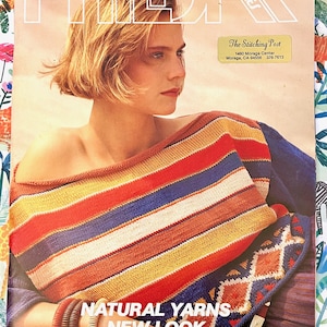 May include: Magazine cover featuring a woman wearing a colorful striped knit top. The text reads "Natural Yarns, New Look, All About Spring Fashion." The background is a floral pattern.