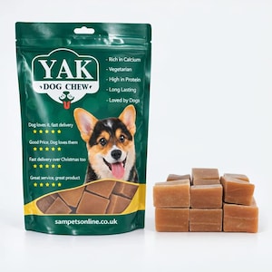 May include: A green bag of YAK Dog Chew treats featuring a corgi. The bag states the chews are rich in calcium, vegetarian, high in protein, long lasting, and loved by dogs. Several brown dog chews are stacked next to the bag. Website: sampetsonline.co.uk.