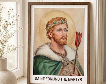 May include: A framed print of Saint Edmund the Martyr featuring a bearded man with a crown, a green cloak with white fur trim, and a red-feathered arrow. The text SAINT EDMUND THE MARTYR is printed in black at the bottom of the portrait.