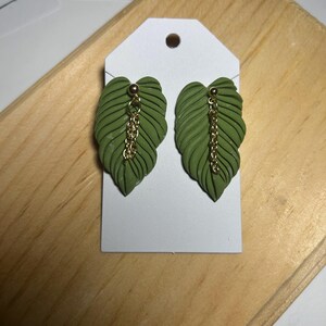 Green polymer clay leaf earrings with golden findings