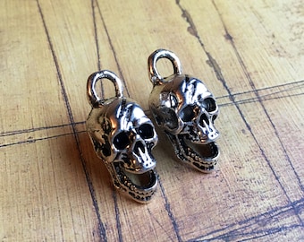 2 Silver Tone Skull Charms