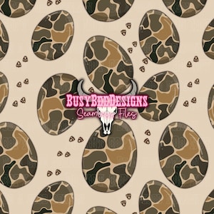 May include: A seamless pattern featuring brown and green camouflage eggs on a beige background. The pattern is repeated throughout the image. The text "Busy Bee Designs Seamless Files" is in pink letters at the bottom center of the image.