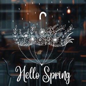 May include: A shop window with a white graphic of an umbrella filled with flowers and the text "Hello Spring".
