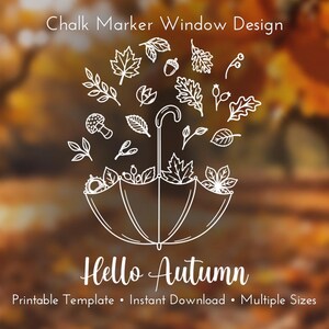 Op de afbeelding: Een witte lijntekening van een paraplu gevuld met diverse herfstbladeren, eikels, bessen en een paddenstoel. De tekst luidt Chalk Marker Window Design bovenaan en Hello Autumn onderaan, met Printable Template, Instant Download, Multiple Sizes eronder.