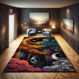 May include: A large, rectangular rug with a celestial design. The rug features a vibrant colour palette, including orange, yellow, blue, and purple. The design includes a crescent moon, stars, and a rainbow. The rug is placed in a room with blue armchairs and landscape paintings.