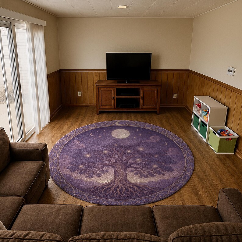 May include: A round, purple rug featuring a tree design with a full moon and stars. The rug has a detailed border and is placed in a living room setting with a brown sofa, TV, and wooden furniture.