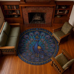 May include: A round area rug featuring a peacock design in shades of blue, purple, and gold. The peacock is centered on the rug, with its tail feathers fanned out. The rug is surrounded by a gold border and is placed on a hardwood floor.