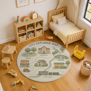 May include: A child's bedroom with a round "City Explorer Map" rug featuring illustrations of a school, park, bakery, and train station. A wooden bed, toy cart, and storage unit are also visible.