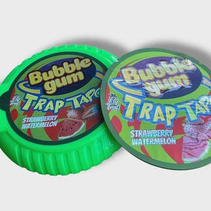 May include: Two packages of Bubble Gum Trap Tape, strawberry watermelon flavor. One is a green dispenser, the other a round label. The labels feature a watermelon slice and strawberry graphic.