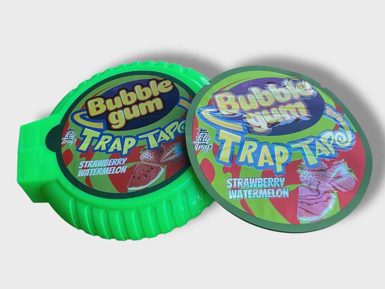 May include: Two packages of Bubble Gum Trap Tape, strawberry watermelon flavor. One is a green dispenser, the other a round label. The labels feature a watermelon slice and strawberry graphic.