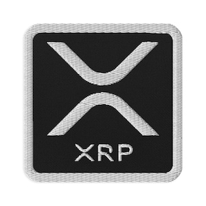 May include: A black and white embroidered patch with the XRP logo and the word "XRP" in white.