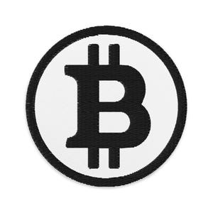 May include: A black and white embroidered patch with a Bitcoin symbol in the center. The symbol is surrounded by a white circle with a black outline.