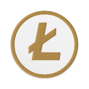 May include: A gold embroidered patch with a stylized letter L in the center. The patch is circular and has a white background.