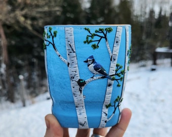 Blue Jay Mom and Her Nest with Eggs in a Birch Woodland Sculpted with Polymer Clay onto a Recycled Glass Candle Holder in Sky Blue