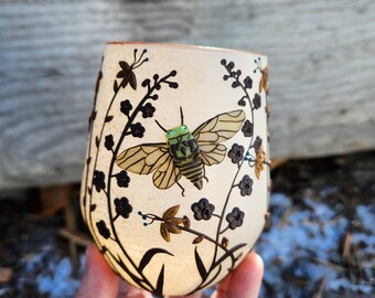 Phosphorescent Cicada Amongst the Wildflowers Sculped with Polymer Clay onto a Recycled Glass Candle Holder in Cream