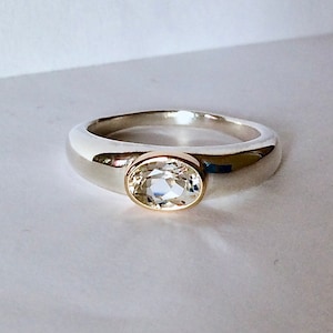 Simple Oval White Topaz Solitaire Ring