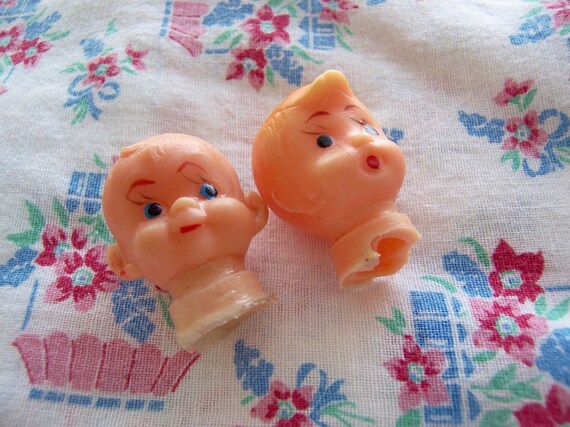 rubber doll heads