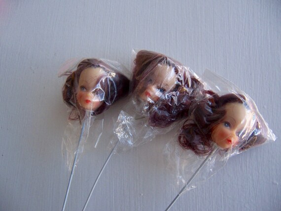 rubber doll heads