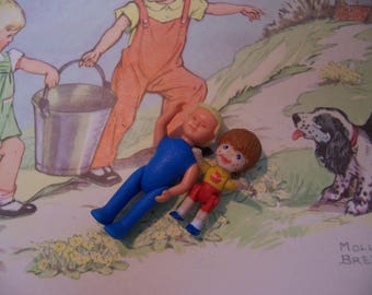 two tiny wee posable dolls