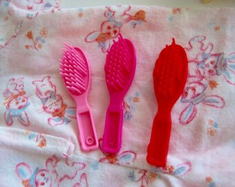 brushes / vintage doll hair brushes