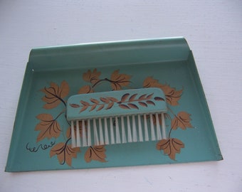 tin crumb pan and nylon brush