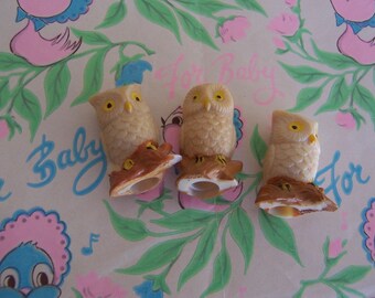 three little owl figurines