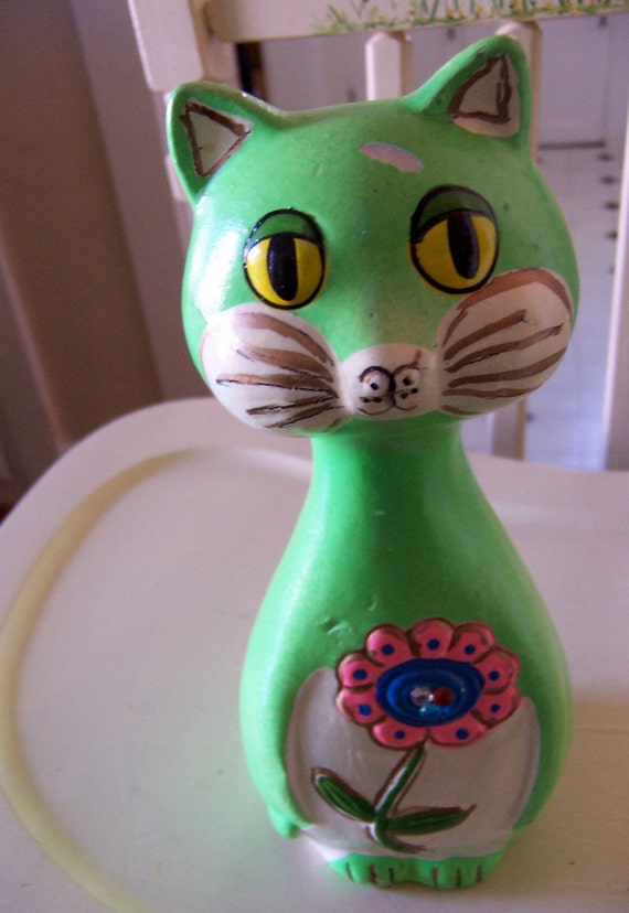 adorable green plaster cat bank
