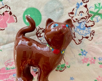 brown cat figurine