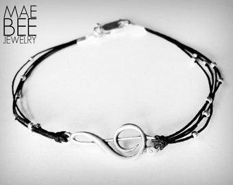 Pulsera de clave de sol en plata de ley: joyería para amantes de la música