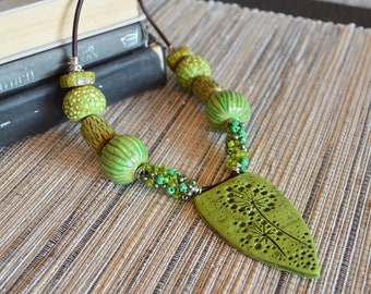 One of a kind statement beaded polymer clay pendant necklace / earthy green tones, huge handmade beads / chunky organic distressed tribal