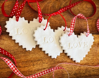 Valentines heart ornaments / red white present package tie on tags / Hostess gifts / pure white ceramic hanging ornaments / boho gift decor