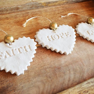 3 Heart shaped "Faith Hope Love" boho decor ornaments / Present package tie on tags / Hostess gifts / Bisque pure white hanging ornaments
