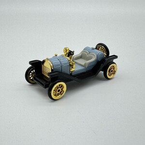 Vintage Reader's Digest High Speed Corgi Mercer Azzurro Chiaro e Oro N. HF9089