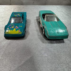 2 Vintage Tootsie Toys Model Corvette’s