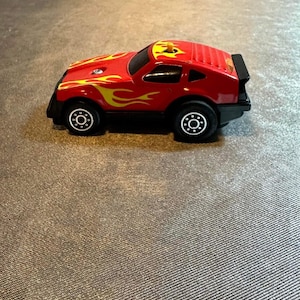 VINTAGE Tonka Toy Race Car Friction Button Activate Made In JAPAN VTY