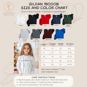 May include: A size and color chart for Gildan 18000B Youth Heavy Blend crewneck sweatshirts. The chart displays various colors, including white, black, red, navy, and forest green. Measurements are provided in inches for sizes XS to XL, with fit sizes ranging from 6-8 to 14-16.
