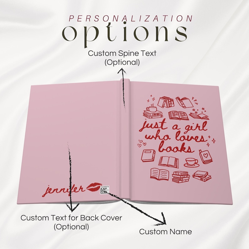 May include: Open pink journal with the text "just a girl who loves books" and illustrations of books and a teacup. The journal has the name "jennifer" and a lipstick kiss mark. The cover has personalization options.