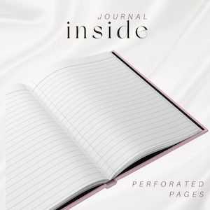 May include: Open journal with lined, perforated pages. The journal has a pink cover and black spine. The words "JOURNAL inside" and "PERFORATED PAGES" are printed on the image.