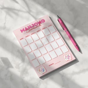 May include: A set of three ceramic mugs with a speckled, matte finish. The mugs are in shades of cream, light gray, and dark gray. Each mug has a simple, minimalist design, perfect for coffee or tea.