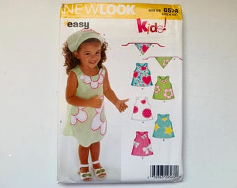 New Look Kids! Patrón sin cortar 6578 para niña pequeña, talla A - 1/2 a 4, vestido de verano sin mangas para niña, pañuelo para la cabeza, apliques, cinco tallas en una.