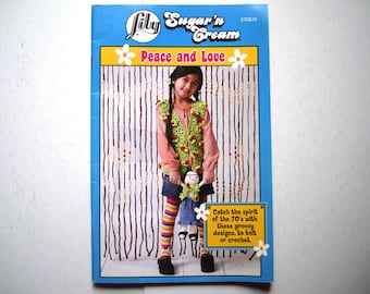 PAZ Y AMOR de Lily Folleto 570829 Patrones de punto y ganchillo Niño Joven Sudadera con capucha unisex Poncho Chaleco Falda Gorro Collares Muñeca y armario