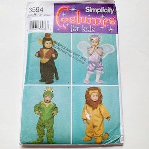 May include: A Simplicity pattern for children's costumes. The pattern includes four costumes: a monkey, a frog, a lion, and a fairy. The pattern is for sizes 1/2, 1, 2, 3, and 4.