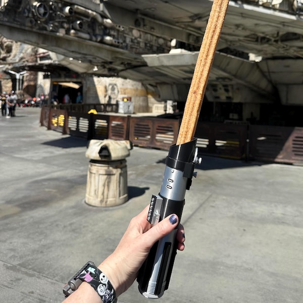 SnackSabers! Darth Vader Star Wars inspired churro & snack holder that can also use collapsible blades in many colors to choose from!