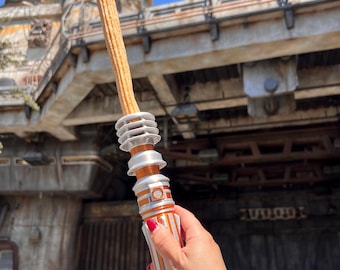 SnackSabers! Princess Leia Star Wars inspired churro & snack holder that can also use collapsible blades in many colors to choose from!