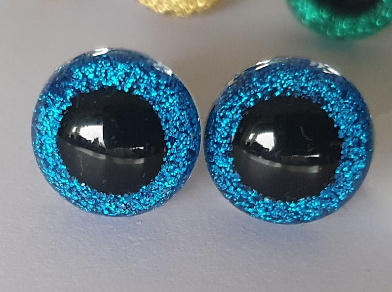 10 paires d'yeux pailletés 12 mm, colorés Bleu